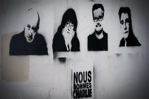 Charlie Hebdo team struggles to heal after massacre