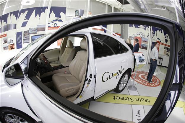 Car sector welcomes tech giants, but battles loom