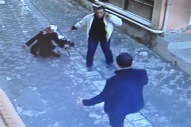 Man stabs wife in street over divorce request