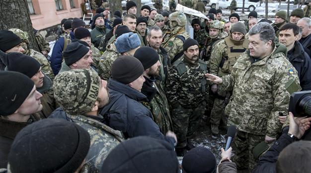Ukraine, Russia, Germany, France urge truce compliance, condemn breaches