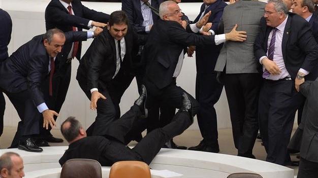Opposition deputy falls from stairs at Turkish parliament amid fight over security bill