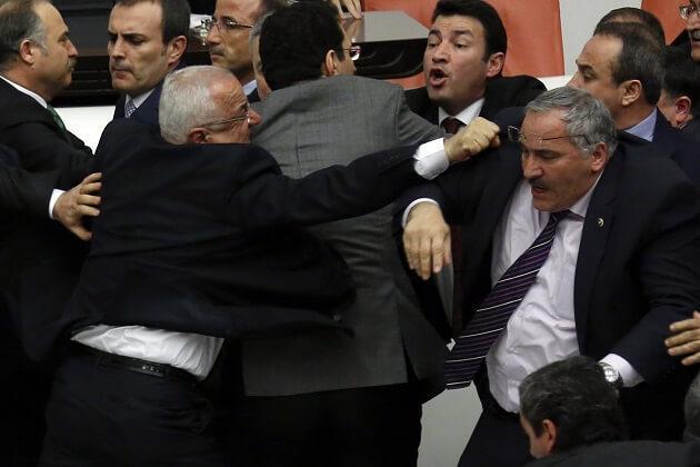Opposition deputy falls from stairs at Turkish parliament amid fight over security bill