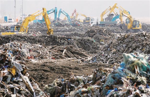 Four years on, Japans tsunami victims frozen in their tragedy