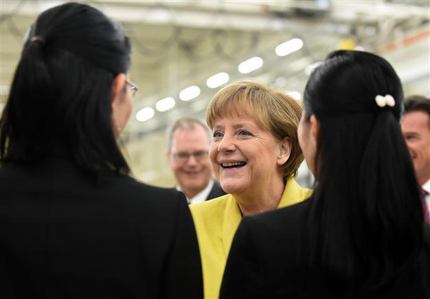 Merkel calls on Japan to settle sex slavery dispute