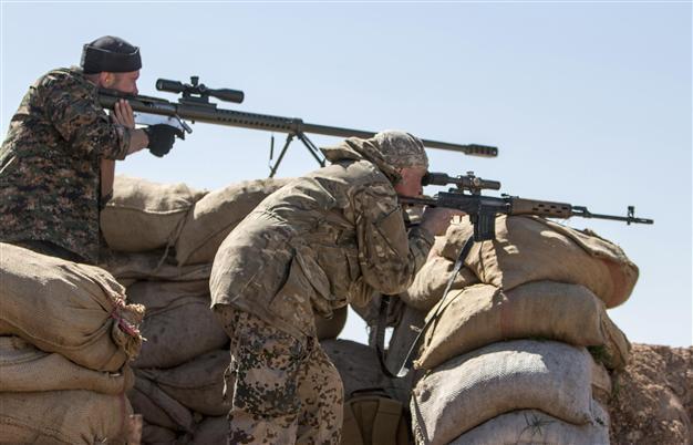 ISIL in major assault on Syria border town: monitor