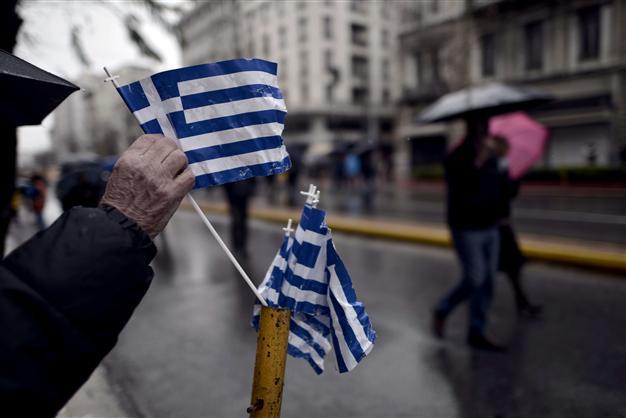 In Greece, folk music and patriotism soothe wounded national pride