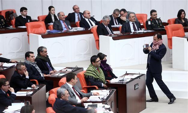 HDP deputies wear poşu at parliament to protest security bill