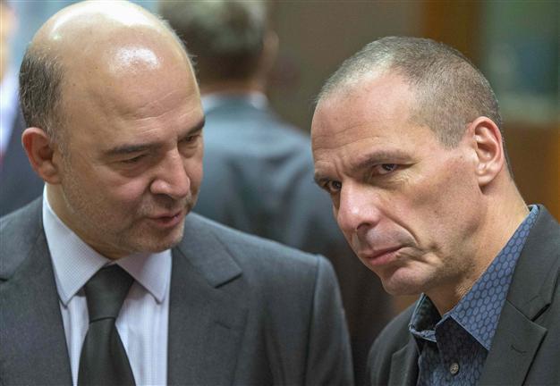 Greece allows lenders back into Athens