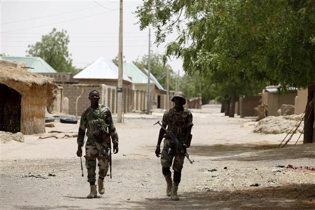 Boko Haram fighters told to kill wives as troops take its headquarters