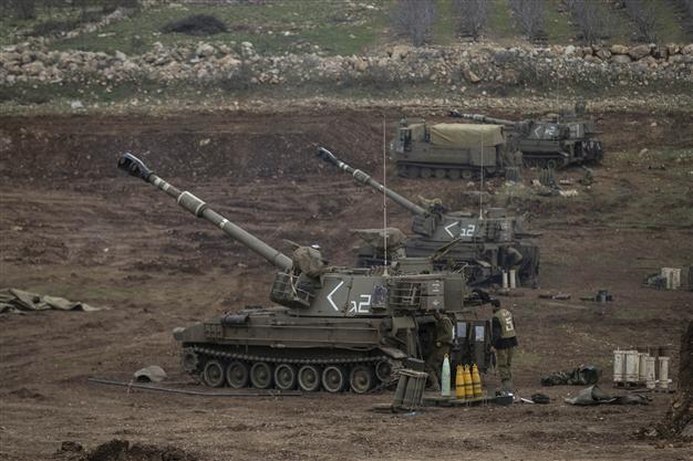 Israel hits Syrian military targets after Golan rockets