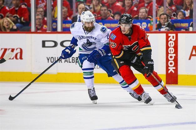 Flames move to second round as NHL post-season heats up