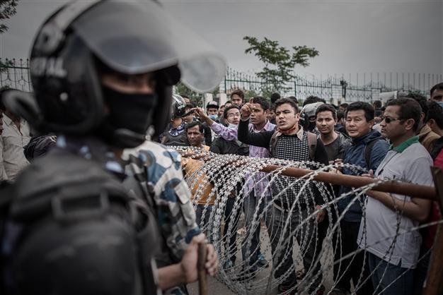Riot police intervene as anger erupts among Nepal quake survivors