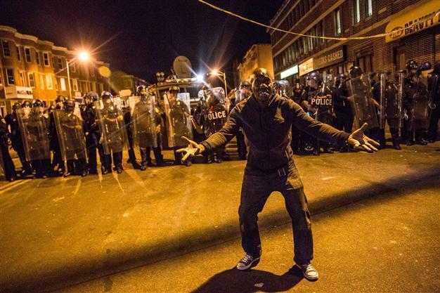 Police enforce curfew in Baltimore, disperse protesters