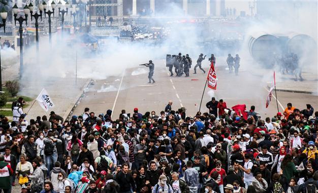 Brazilian teachers clash with police, over 200 hurt