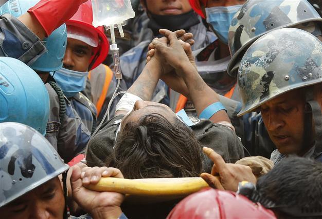Teenager pulled alive from rubble five days after Nepal quake