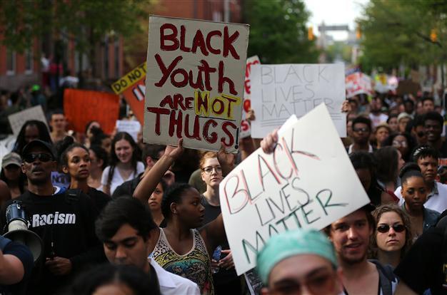 Marchers protest police violence in Baltimore, New York