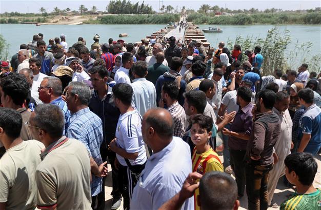 Shiite militias converge on Iraqs Ramadi after ISIL takeover