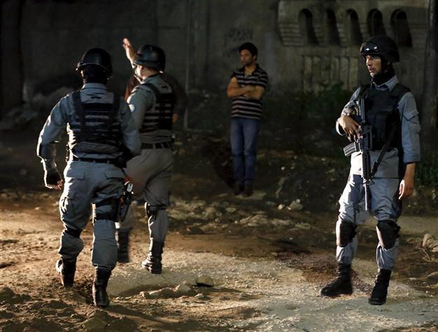 American, Indians among five dead in Kabul guesthouse siege