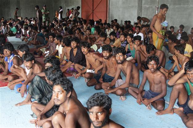 Nearly 800 migrants reach land in Indonesia, others sent back to sea