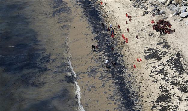 Governor declares emergency as California cleans oil spill