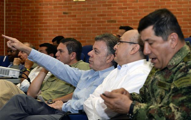 Colombia air strike kills 18 FARC rebels as talks resume