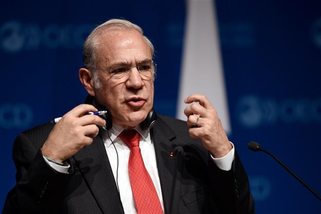 OECD calls US dip a blip, but chops world growth forecast