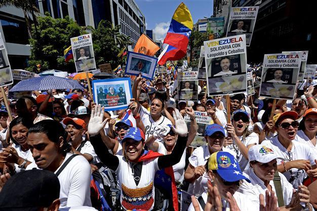 Venezuelans mass for years largest anti-government protests