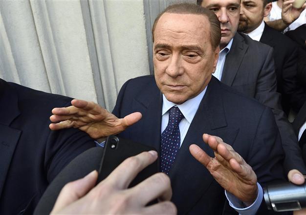 Italians vote in local polls posing test for Berlusconi