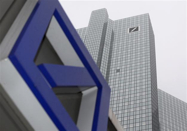 Deutsche Bank shares jump after management purge