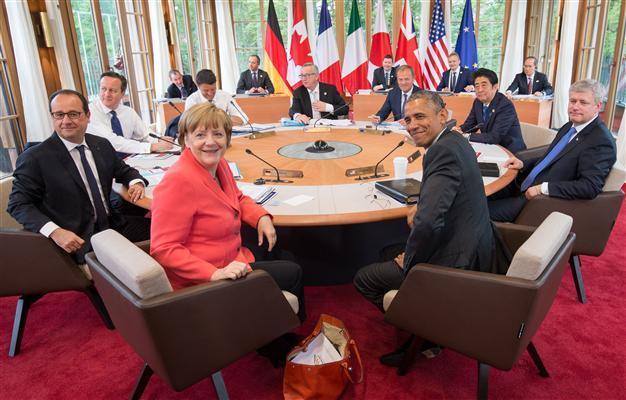 G-7 warns Russia of more sanctions, pledges climate action