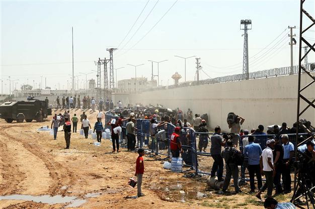 More than 23,000 refugees flee to Turkey in fresh influx from Syria: UN