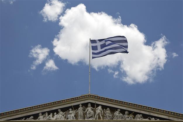 Greece ducks Friday deadline by bundling IMF payments