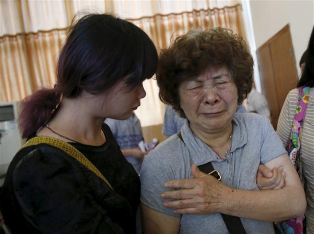 More than 390 confirmed dead in China ship sinking