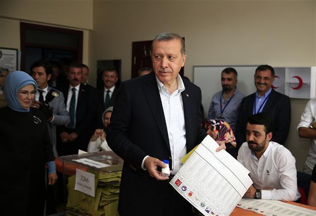 Turkish president casts his vote in parliamentary elections, says high election turnout across country