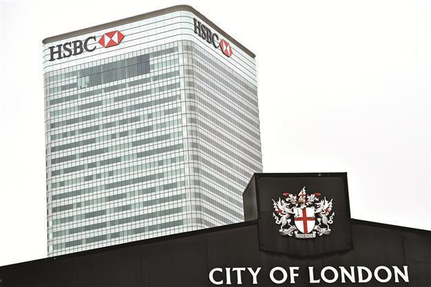 Britain prepares ‘to review bank tax to stop potential exodus’