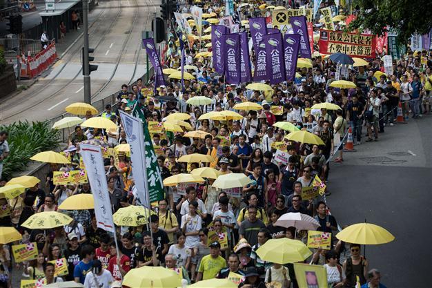 Hong Kong democracy groups take to streets as key vote looms
