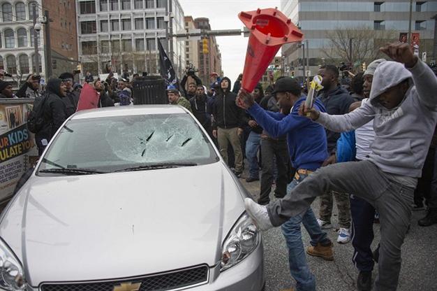 Violence mars Baltimore protest over police custody death