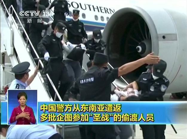 Uighurs on way to jihad returned to China in hoods