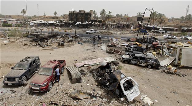 Toll soars to 90 after ISIL bomb guts Iraq town