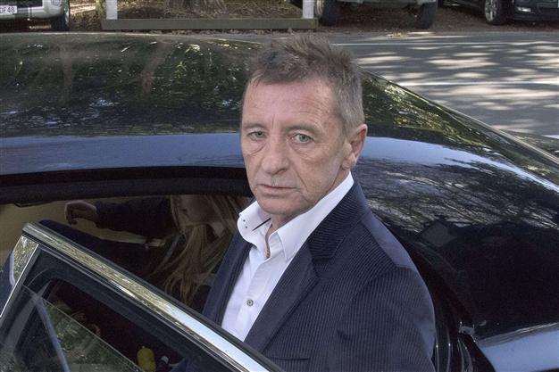 AC/DC’s Rudd charged for alleged breach of home detention rules