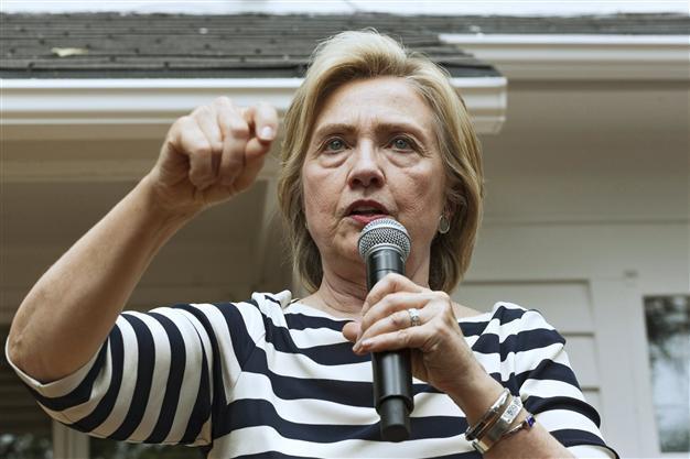 Clinton says shes confident about proper handling of emails