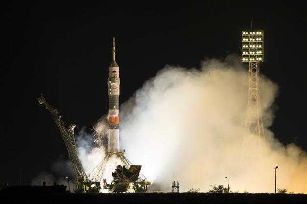 Rocket carrying Russian, Japanese, US crew docks with ISS