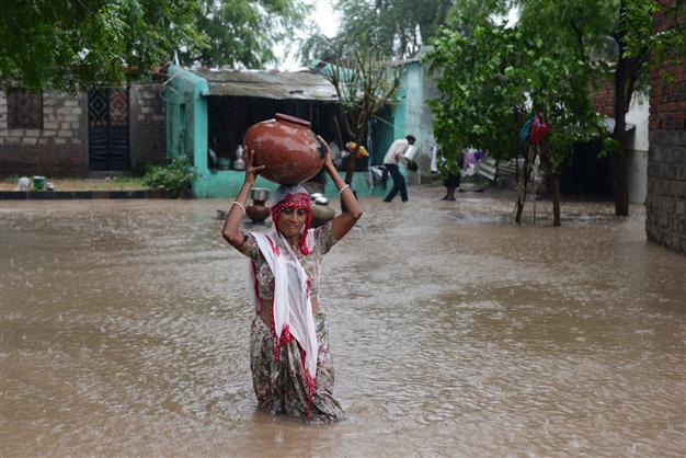 At least 26 dead in flash floods in western India