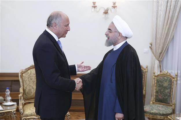 France seeks to warm up Iran ties with Rouhani invite
