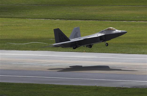 Japan suspends work on US base on Okinawa as Abe battles low ratings