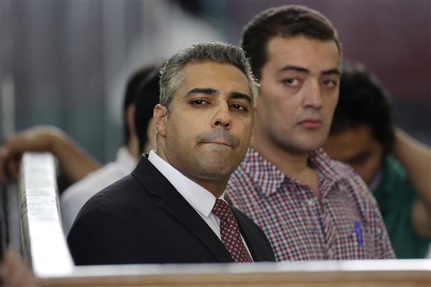 Egypt court again postpones verdict in Jazeera reporters retrial