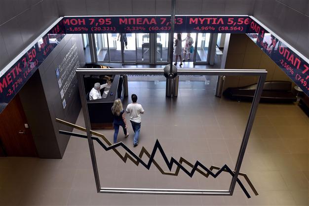 Greek stocks plunge 22 percent as bourse reopens