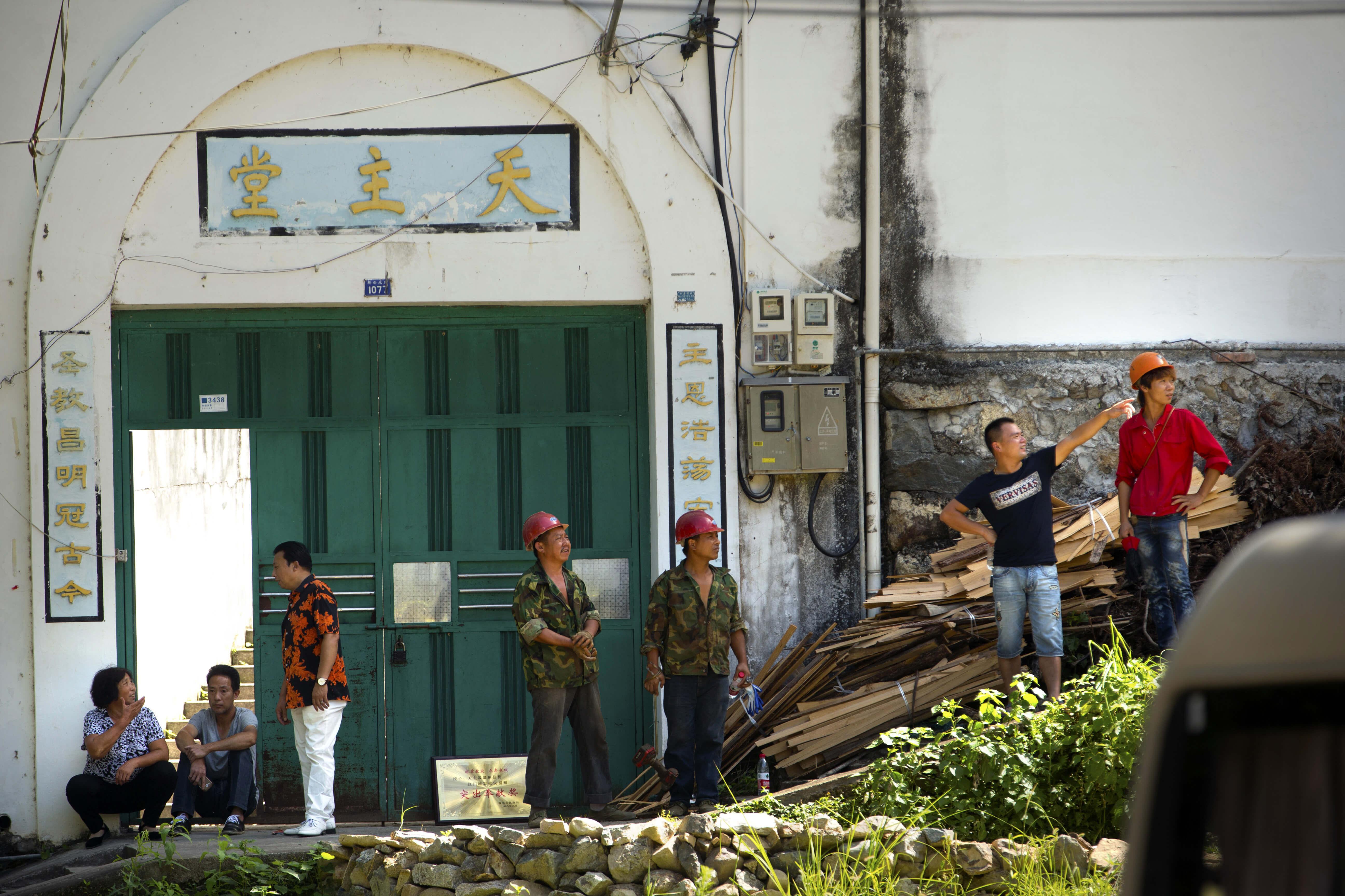 China removes cross from church after month-long protest ends