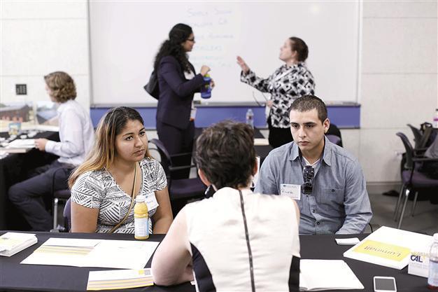 US employers add 215,000 jobs in July
