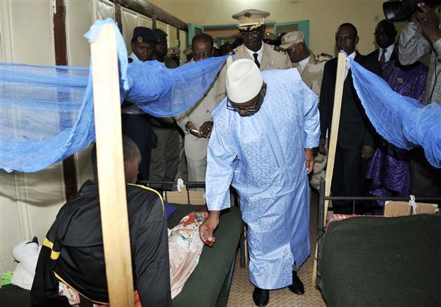 Official: 4 people freed from Mali hotel, 12 people dead